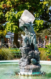 Sculpture The Gnome with the Crystal by Heinrich Natter in Franz Josef Park
