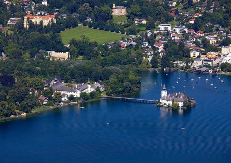 View from the treetop path at Gruenberg to Lake Traun Castle Ort and Gmunden