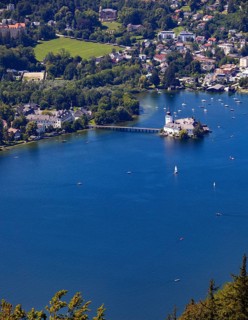 View from the treetop path at Gruenberg to Lake Traun Castle Ort and Gmunden