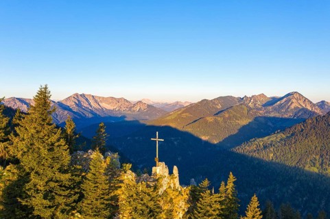 Summit cross on the mountain Vogelsang at Sudelfeld near Bayrischzell