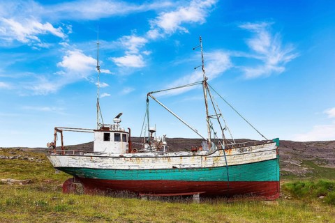 Shipwreck in barren landscape