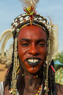 Wodaabe-Bororo man with face painted at the annual Gerewol festival