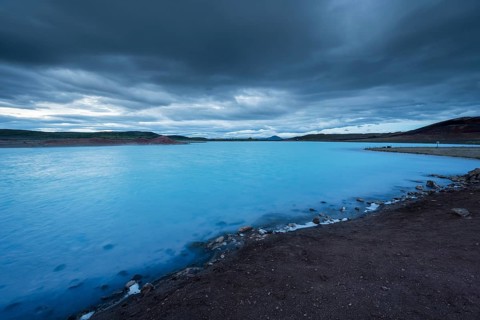 Milky light blue lake Blue Lake at dusk
