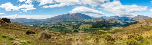 View of the surrounding mountains with The Remarkables mountain range and Lake Wakatipu