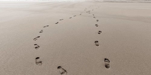Two footprints in the sand