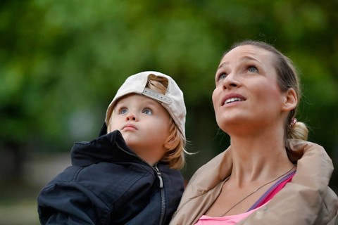Mother holding son