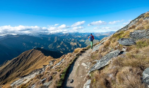 Hiker on the hiking trail to Ben Lomond