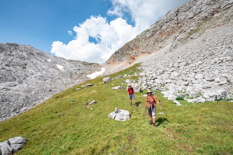Two hikers on a hiking trail around the Funtenseetauern