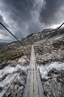Suspension bridge over torrent at the Olpererhuette