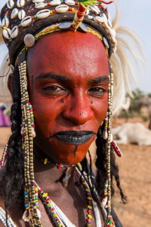 Wodaabe-Bororo man with face painted at the annual Gerewol festival