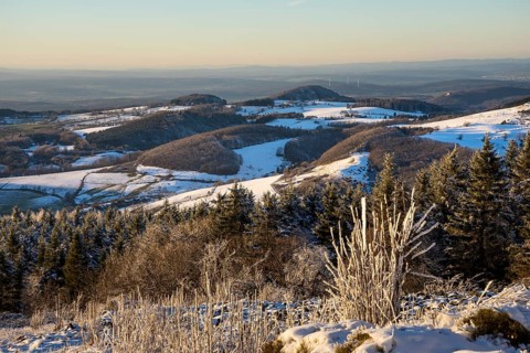 View from the Wasserkuppe over the chain of hills of the Rhoen in winter
