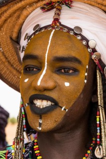 Wodaabe-Bororo man with face painted at the annual Gerewol festival