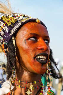 Wodaabe-Bororo man with face painted at the annual Gerewol festival