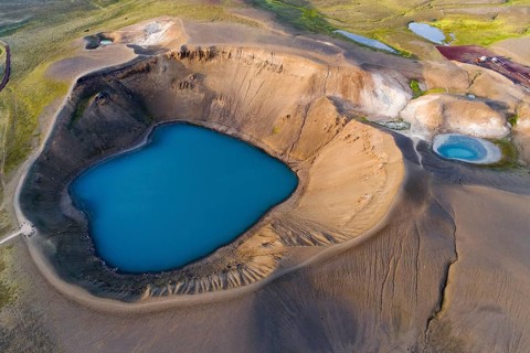 Aerial view of blue lake in the Viti volcano crater at Krafla power plant