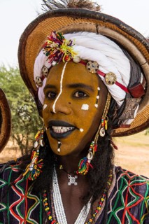 Wodaabe-Bororo man with face painted at the annual Gerewol festival