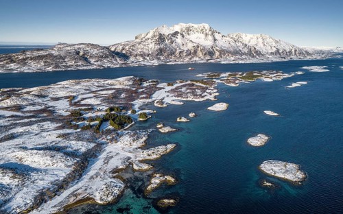 Winter archipelago islands in turquoise sea
