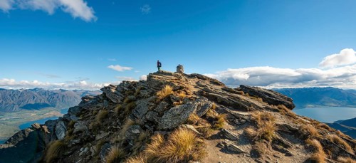 Hiker at the summit of Ben Lomond
