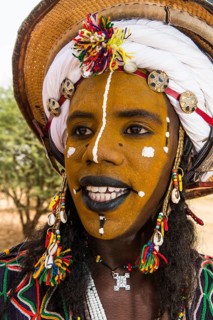Wodaabe-Bororo man with face painted at the annual Gerewol festival