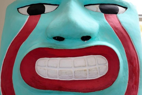 Freshly painted head of the Sechin culture