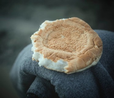 Bread from food distribution for refugees in camp Idomeni