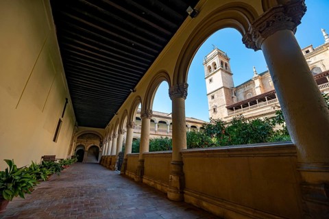 View of the church tower through arcades