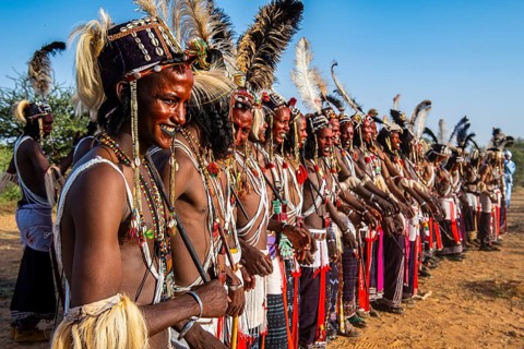 Wodaabe-Bororo men with faces painted at the annual Gerewol festival