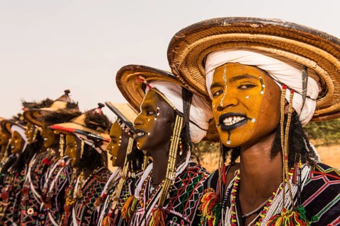 Wodaabe-Bororo men with faces painted at the annual Gerewol festival