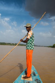 Man in front of a boat