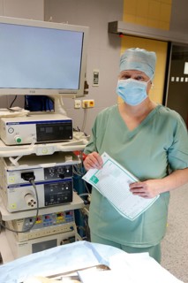 Nurse with respirator in operating theatre