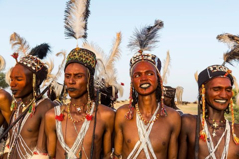 Wodaabe-Bororo men with faces painted at the annual Gerewol festival