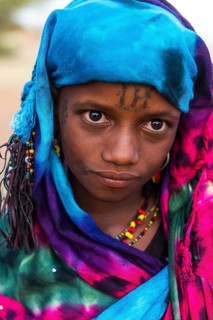 Colourful dressed girl at the Gerewol festival