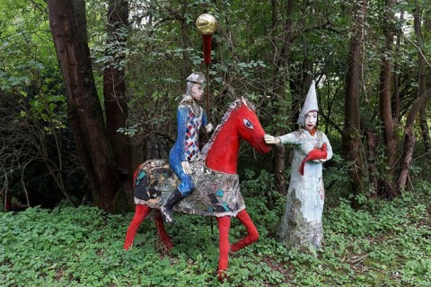 Knight on horseback and woman