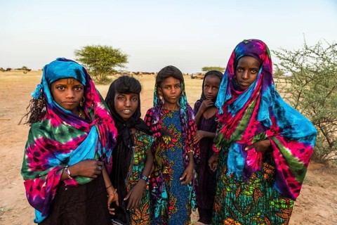 Colourful dressed girls at the Gerewol festival