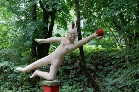 Naked gymnast with ball
