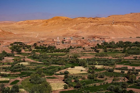 Oasis Tinerhir with old mud houses and newly constructed buildings