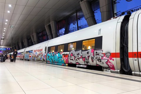 ICE train with graffiti in the station of Frankfurt Airport