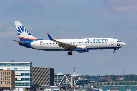 A Boeing 737-800 of SunExpress with the registration TC-SEE at Stuttgart Airport