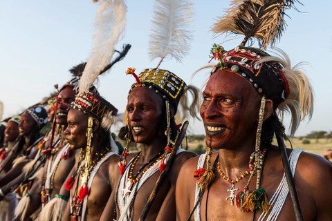 Wodaabe-Bororo men with faces painted at the annual Gerewol festival
