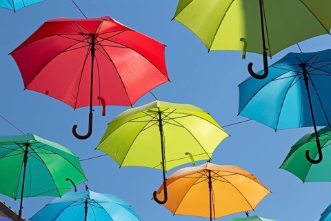 Colourful umbrellas suspended over a street