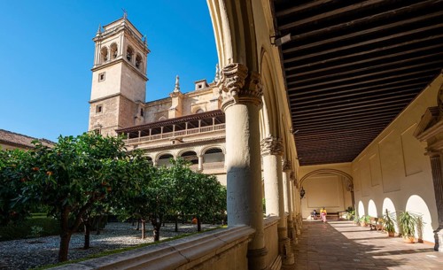 View of the church tower through arcades
