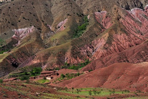 Erosion landscape with small clay village of the Berbers