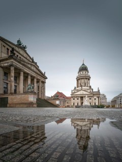 The Gendarmenmarkt with the French Cathedral and the concert hall in Berlin Mitte