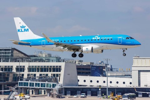 An Embraer ERJ175 of KLM cityhopper with the registration PH-EXM at Stuttgart Airport