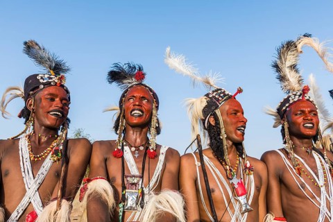 Wodaabe-Bororo men with faces painted at the annual Gerewol festival
