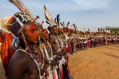 Wodaabe-Bororo men with faces painted at the annual Gerewol festival