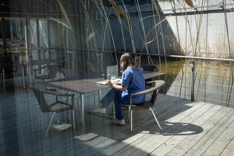 Hospital employee in the canteen during her lunch break