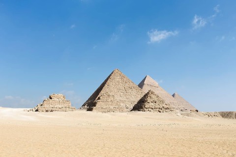 The three main pyramids with the three queen's pyramids in the foreground