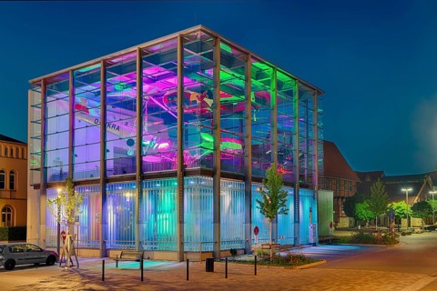 Helicopter museum colourfully illuminated