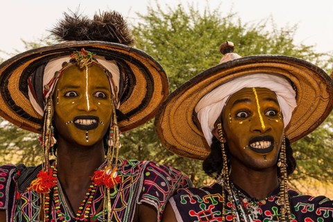 Wodaabe-Bororo men with faces painted at the annual Gerewol festival