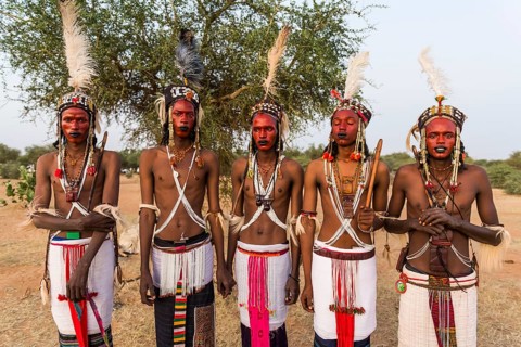 Wodaabe-Bororo men with faces painted at the annual Gerewol festival